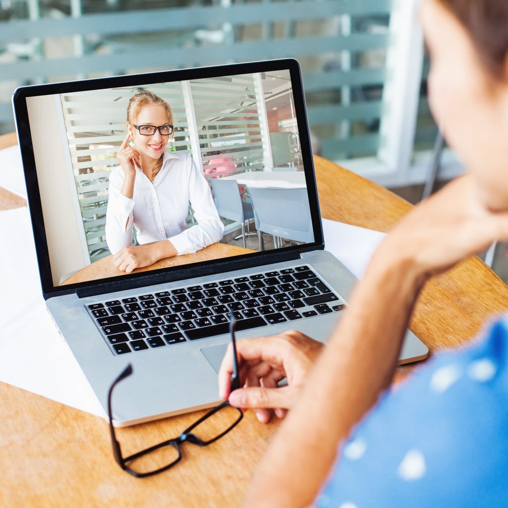 A client talking to a virtual assistant after getting the best answer on what is a va