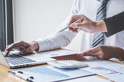 accounting assistant working on financial transactions and accounting related tasks